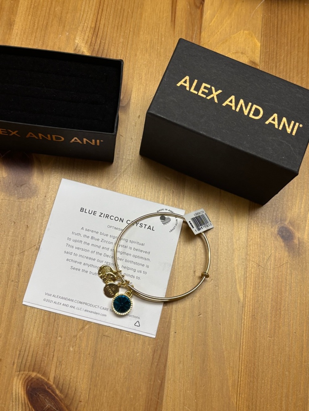 Alex and Ani Gold Bangle with December birthstone